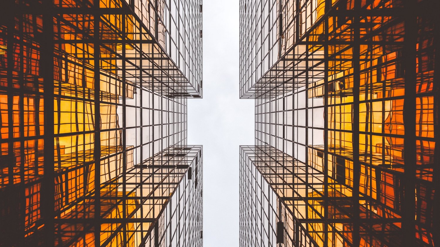 looking upward at skyscrapers