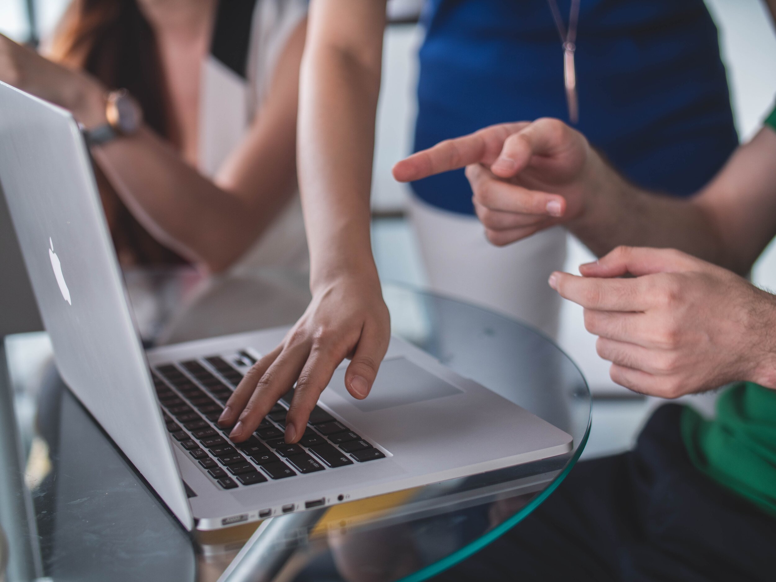 people working on a laptop