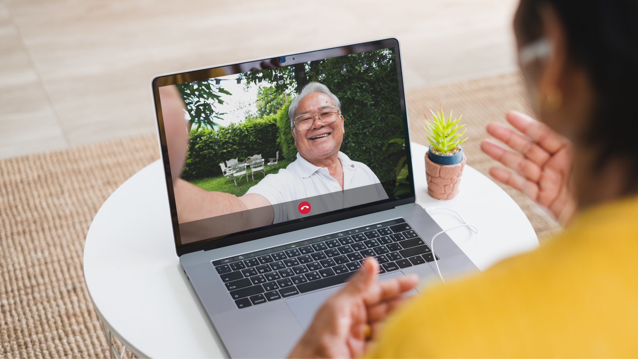 person having a video call on their laptop