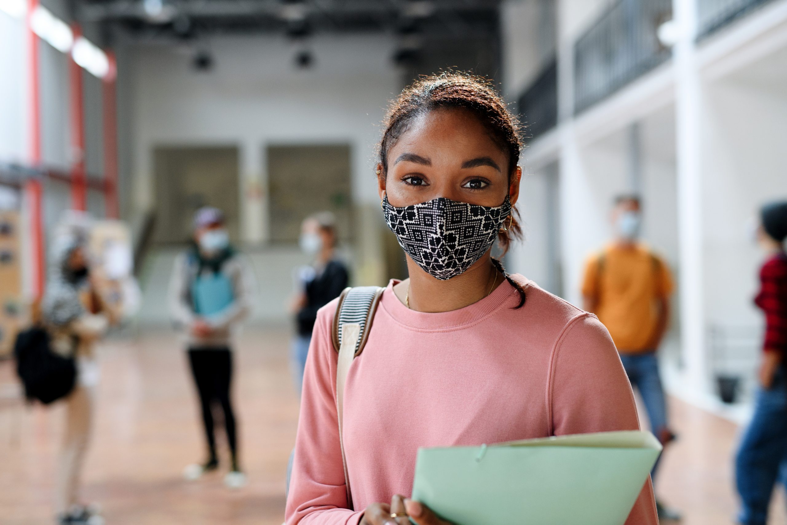 student with face mask back at college or university, coronavirus concept